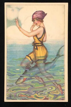 Woman in water with fish